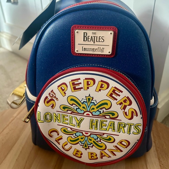 Loungefly Handbags - Loungefly The Beatles Blue Backpack LAST ONE